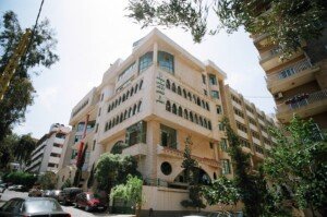 مبنى حجري متعدد الطوابق يضمّ معهد علي الأكبر المهني والتقني في خلدة، بيروت | A multi-story stone building housing Ali Al-Akbar Vocational and Technical Institute in Khalde, Beirut